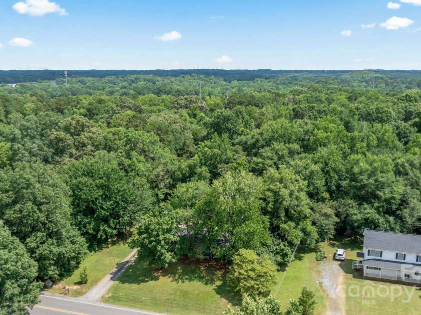 5914 Mt Holly Huntersville Road, Charlotte, NC 28216.  MLS# CAR4273144, YatesRealty ID 29300. 1.29 acre lot