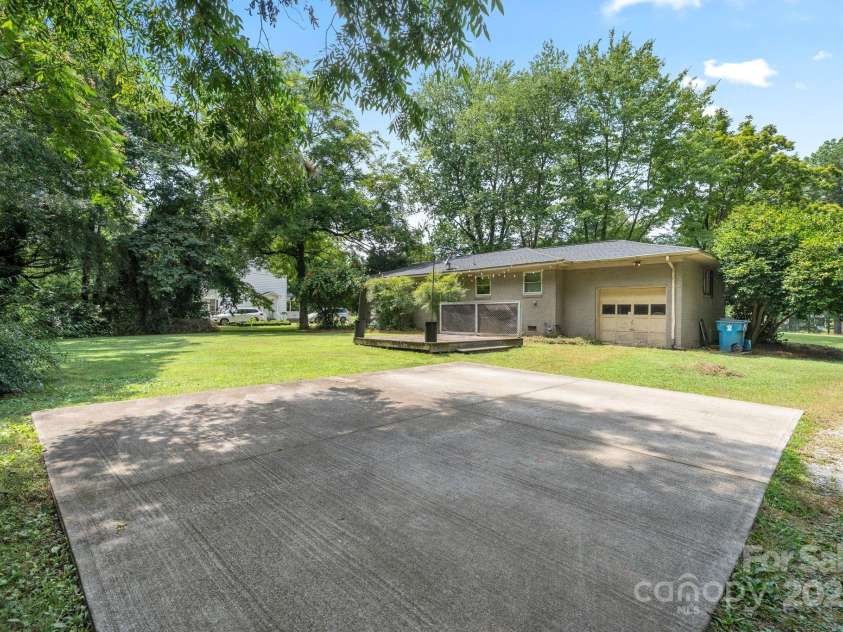 5914 Mt Holly Huntersville Road, Charlotte, NC 28216.  MLS# CAR4273144, YatesRealty ID 29300. Concrete parking pad