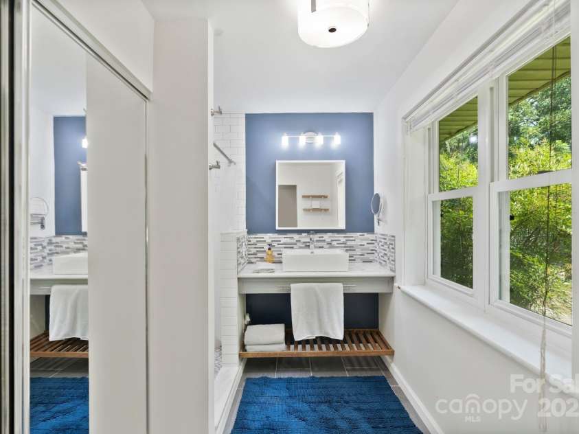 5914 Mt Holly Huntersville Road, Charlotte, NC 28216.  MLS# CAR4273144, YatesRealty ID 29300. En-suite bathroom