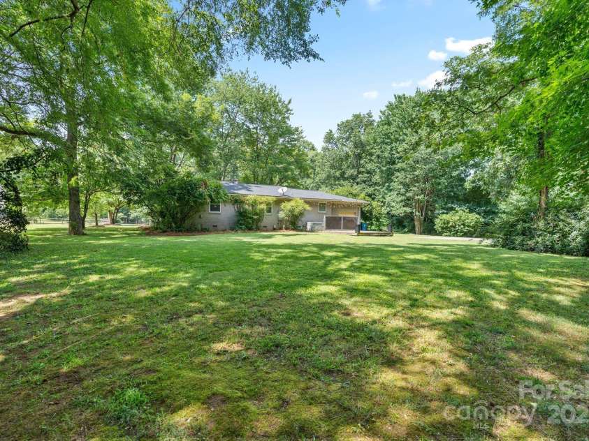 5914 Mt Holly Huntersville Road, Charlotte, NC 28216.  MLS# CAR4273144, YatesRealty ID 29300. Private backyard