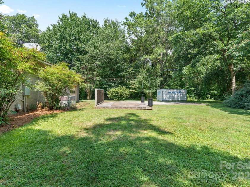 5914 Mt Holly Huntersville Road, Charlotte, NC 28216.  MLS# CAR4273144, YatesRealty ID 29300. Private backyard