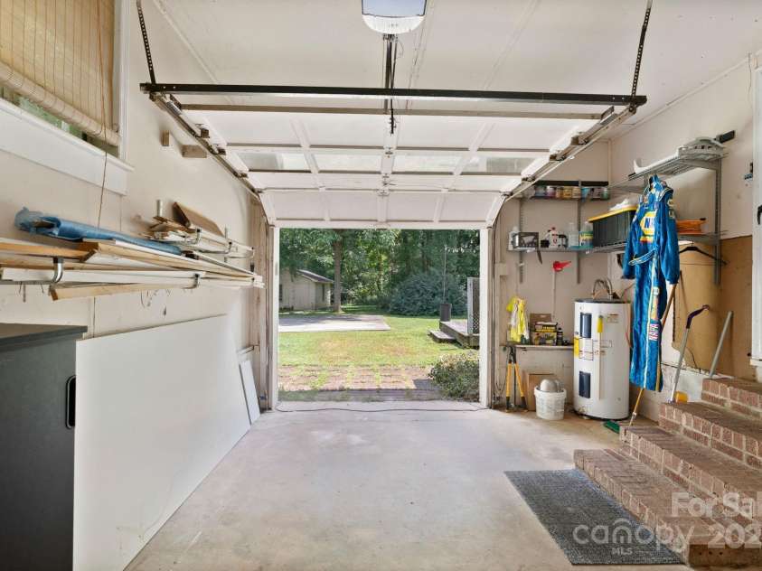 5914 Mt Holly Huntersville Road, Charlotte, NC 28216.  MLS# CAR4273144, YatesRealty ID 29300. Rear load garage
