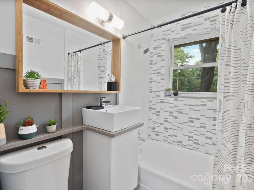 5914 Mt Holly Huntersville Road, Charlotte, NC 28216.  MLS# CAR4273144, YatesRealty ID 29300. Updated hallway bathroom