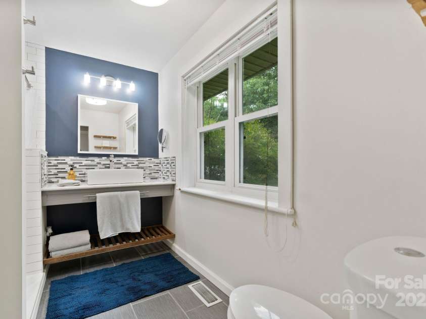 5914 Mt Holly Huntersville Road, Charlotte, NC 28216.  MLS# CAR4273144, YatesRealty ID 29300. Updated primary bathroom