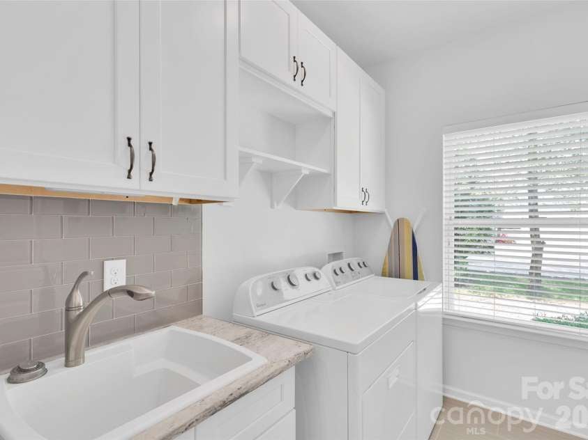 8214 Aspen Court, Charlotte, NC 28227.  MLS# CAR4272999, YatesRealty ID 29302. Laundry Room