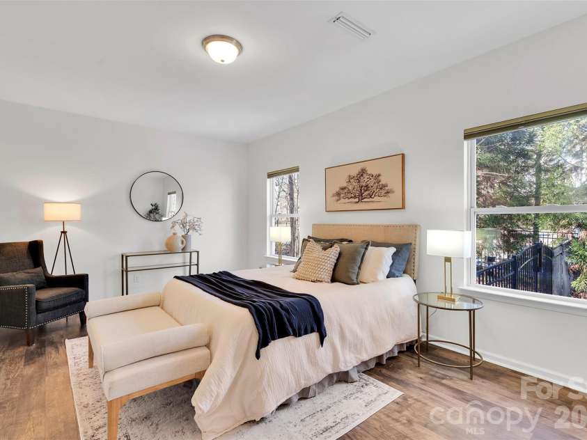 8214 Aspen Court, Charlotte, NC 28227.  MLS# CAR4272999, YatesRealty ID 29302. Main floor primary bedroom