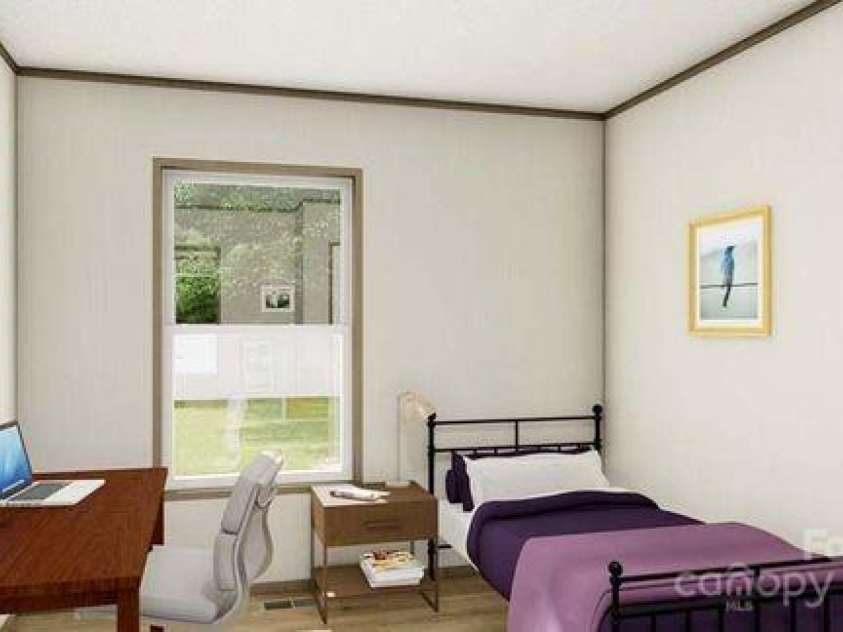 22 McGee Hill Road, Fairview, NC 28730.  MLS# CAR4234779, YatesRealty ID 29308. Guest bedroom. Similar photo.
