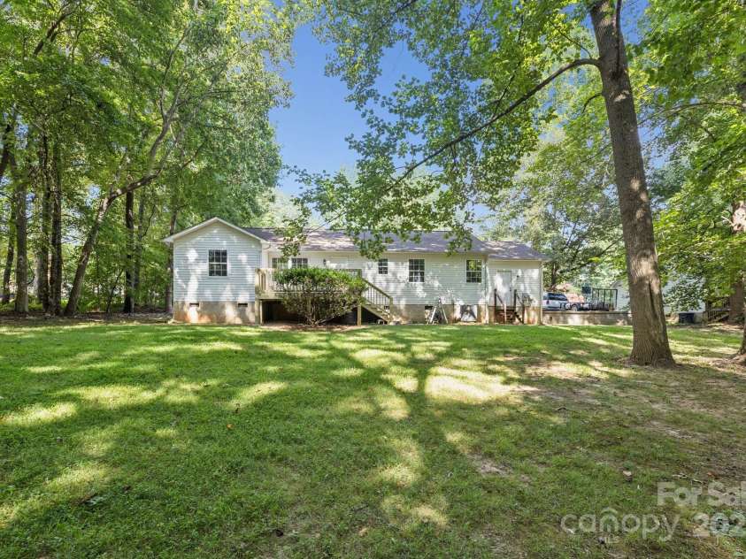 125 Mills Forest Lane, Mooresville, NC 28117.  MLS# CAR4284416, YatesRealty ID 29311. 