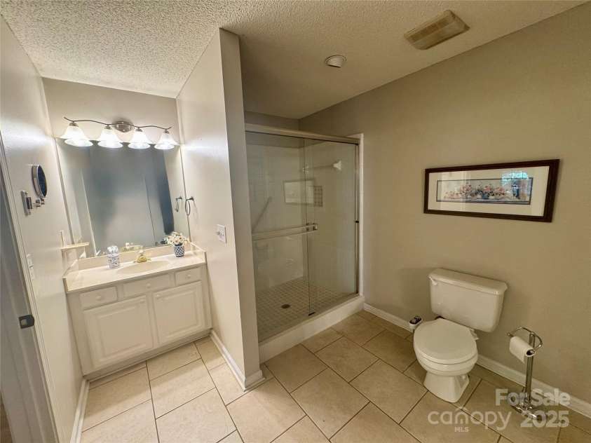 21120 Cold Spring Lane, Cornelius, NC 28031.  MLS# CAR4276142, YatesRealty ID 29315. Primary Bathroom
