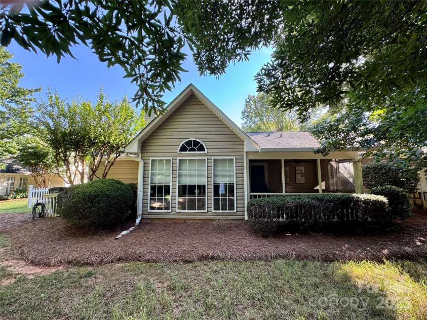 21120 Cold Spring Lane, Cornelius, NC 28031.  MLS# CAR4276142, YatesRealty ID 29315. Rear elevation. Backs up to walking trail and wooded area.