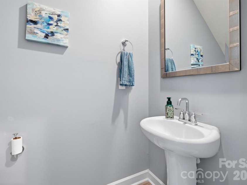 2010 Red Ash Drive, Charlotte, NC 28215.  MLS# CAR4363985, YatesRealty ID 29330. Guest Half-Bath on Main Level