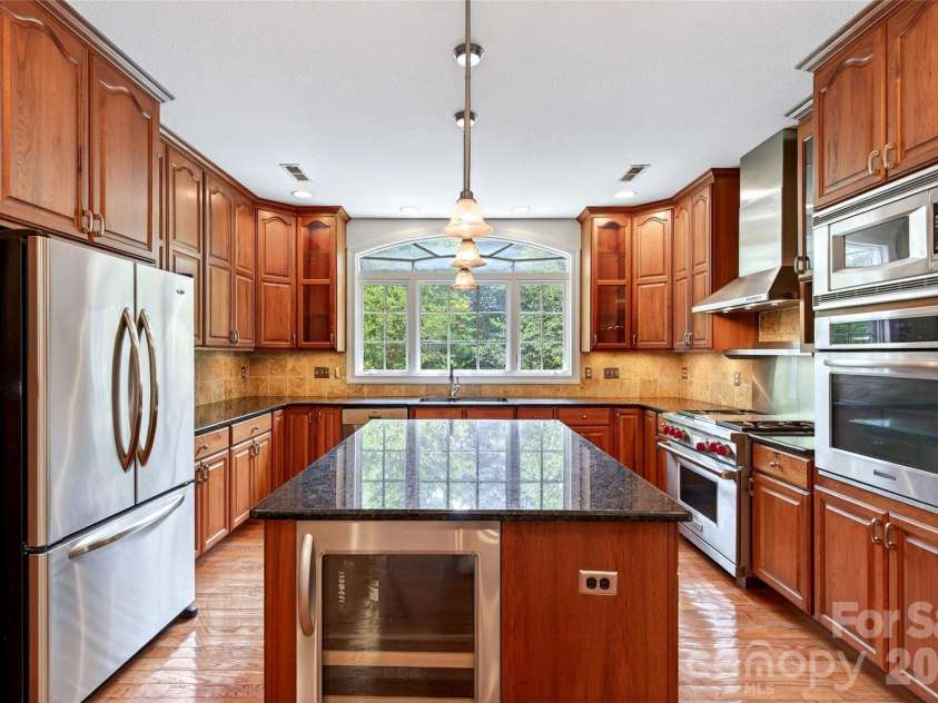 104 Valley Vista Drive, Black Mountain, NC 28711.  MLS# CAR4388162, YatesRealty ID 29333. Large kitchen with high end appliances, custom cabinets and granite countertops