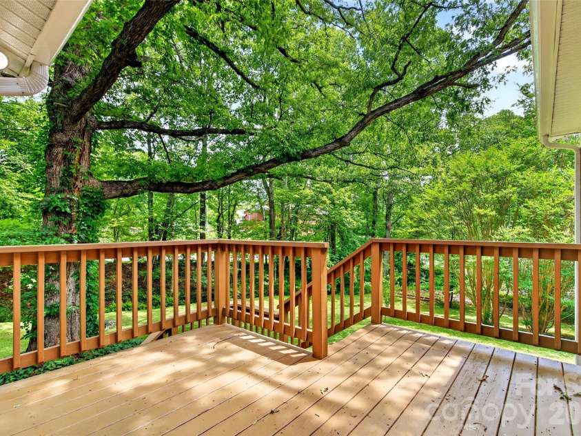 104 Valley Vista Drive, Black Mountain, NC 28711.  MLS# CAR4388162, YatesRealty ID 29333. Shaded deck area off of kitchen 