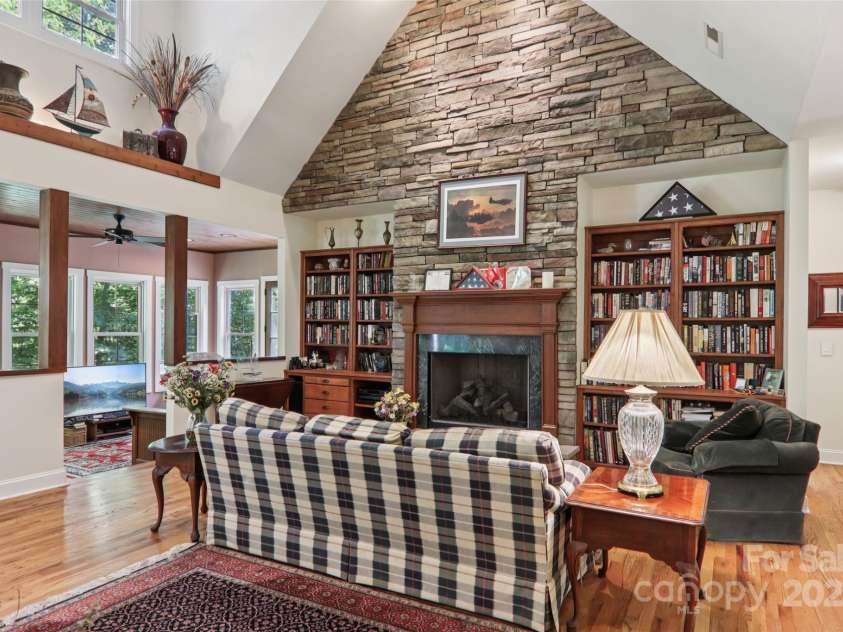 398 Falling Leaves Lane, Hendersonville, NC 28792.  MLS# CAR4267350, YatesRealty ID 29335. Great Room with floor to ceiling fireplace
