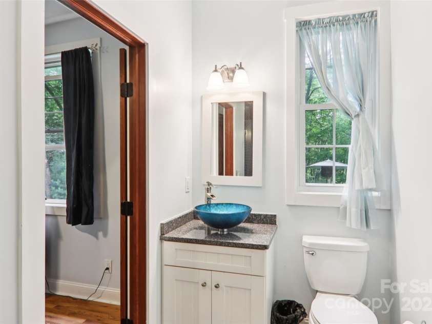398 Falling Leaves Lane, Hendersonville, NC 28792.  MLS# CAR4267350, YatesRealty ID 29335. Guest Bathroom