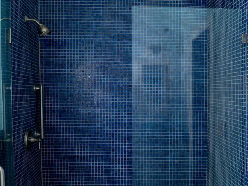 398 Falling Leaves Lane, Hendersonville, NC 28792.  MLS# CAR4267350, YatesRealty ID 29335. Guest bathroom with tile walk-in shower