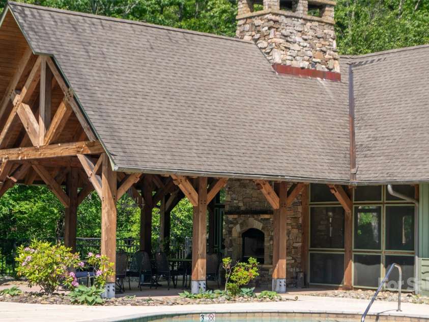 398 Falling Leaves Lane, Hendersonville, NC 28792.  MLS# CAR4267350, YatesRealty ID 29335. Open & Screened patio with see through fireplace