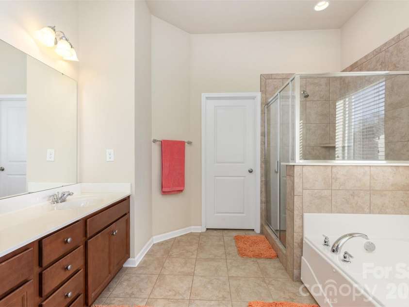 10585 Sweethaven Lane, Harrisburg, NC 28075.  MLS# CAR4356507, YatesRealty ID 29338. Primary Bathroom