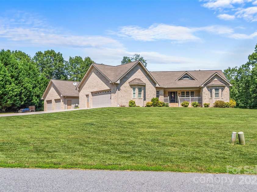 142 Windsor Drive, Taylorsville, NC 28681.  MLS# CAR4283783, YatesRealty ID 29339. Attached and Detached 2-Car Garages