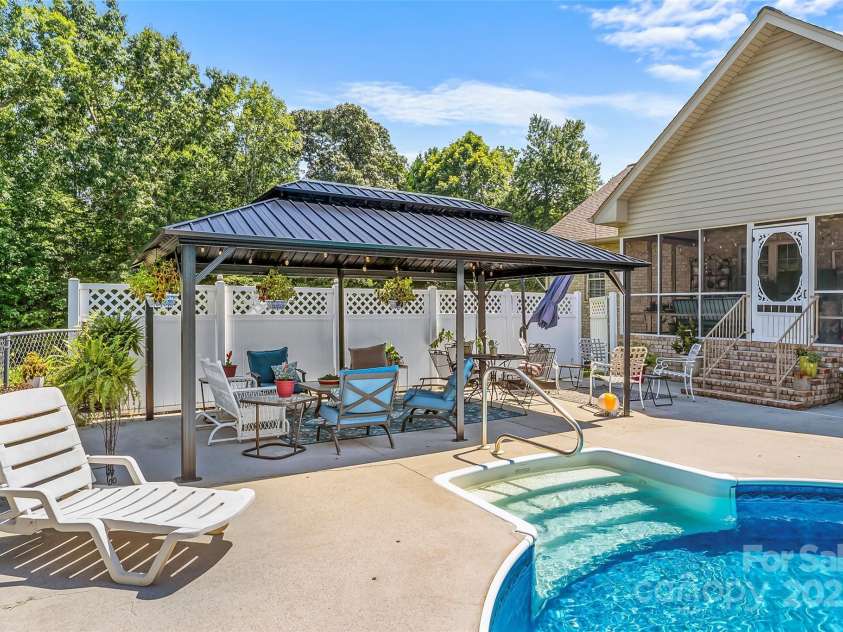 142 Windsor Drive, Taylorsville, NC 28681.  MLS# CAR4283783, YatesRealty ID 29339. Cabana/Gazebo for Pool Area (has curtains that can be hung)
