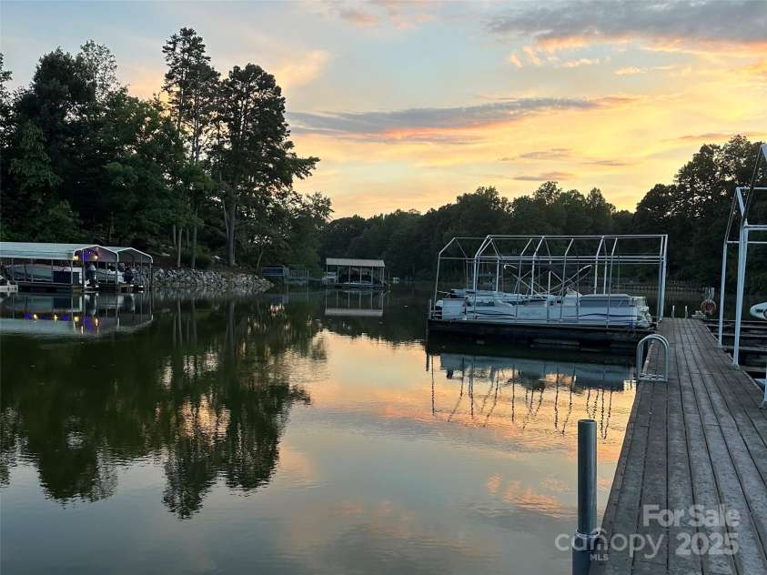 142 Windsor Drive, Taylorsville, NC 28681.  MLS# CAR4283783, YatesRealty ID 29339. Community Dock at Sunset