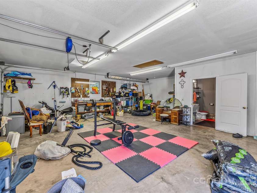 142 Windsor Drive, Taylorsville, NC 28681.  MLS# CAR4283783, YatesRealty ID 29339. Detached Garage with Half Bath for Pool Guests