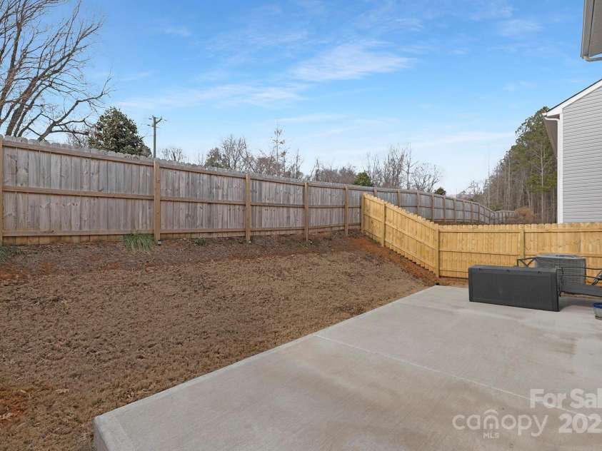 9025 Creedmore Hills Drive, Charlotte, NC 28214.  MLS# CAR4289266, YatesRealty ID 2934. Expanded Rear Patio