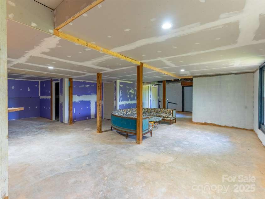 81 Garnet Drive, Leicester, NC 28748.  MLS# CAR4281665, YatesRealty ID 29343. Great Rm in Basement