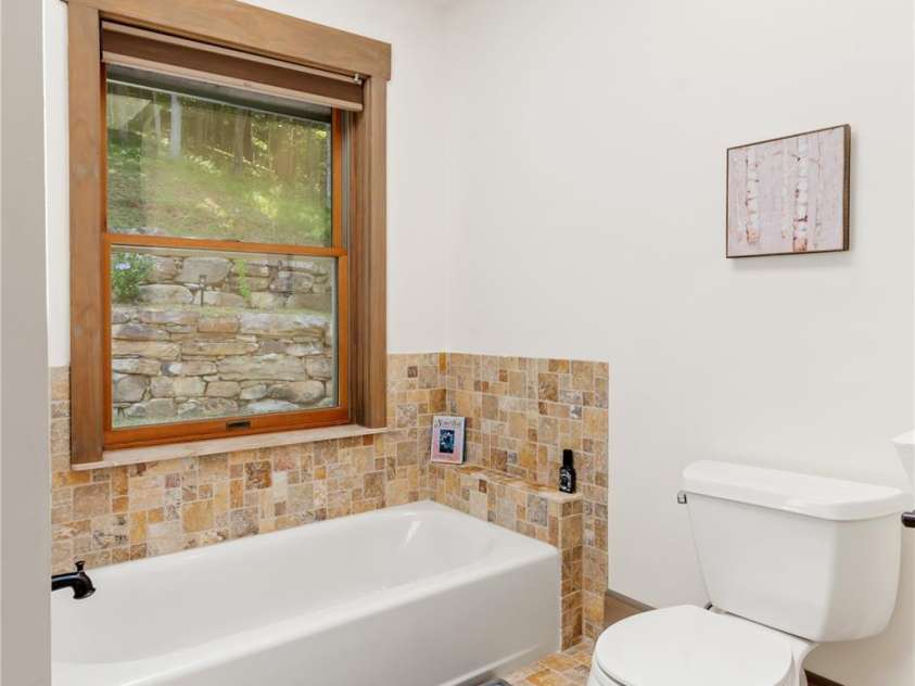 81 Garnet Drive, Leicester, NC 28748.  MLS# CAR4281665, YatesRealty ID 29343. Guest Bath