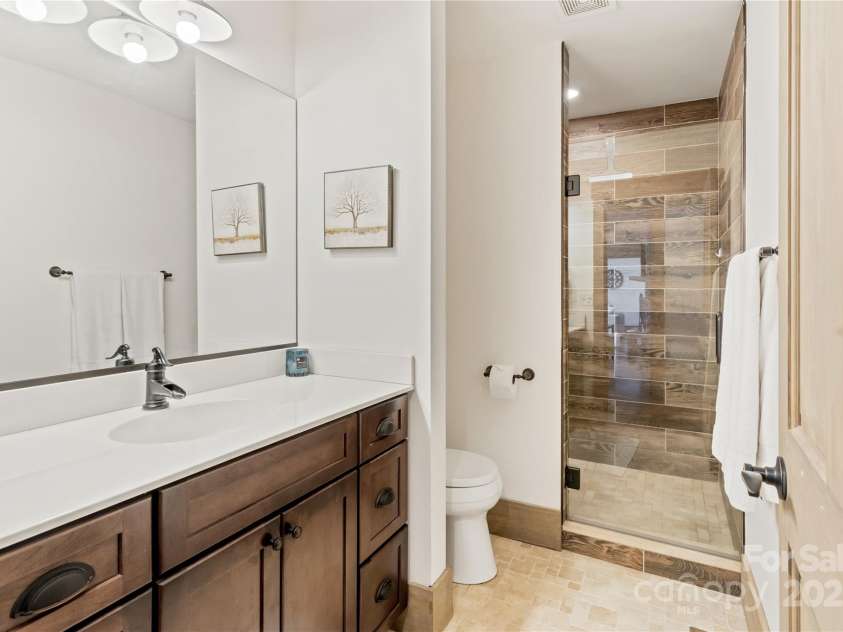 81 Garnet Drive, Leicester, NC 28748.  MLS# CAR4281665, YatesRealty ID 29343. Primary Bath