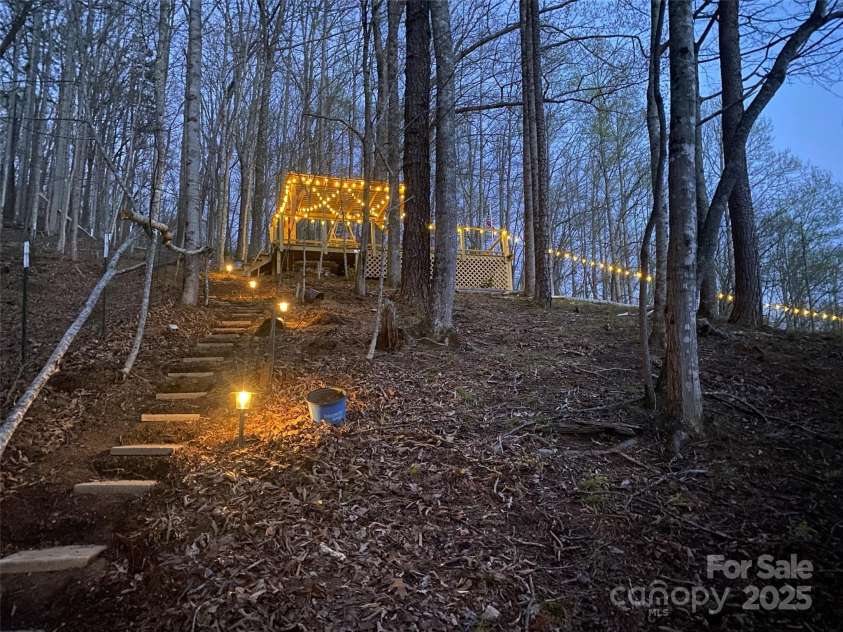 81 Garnet Drive, Leicester, NC 28748.  MLS# CAR4281665, YatesRealty ID 29343. Viewing Deck behind house