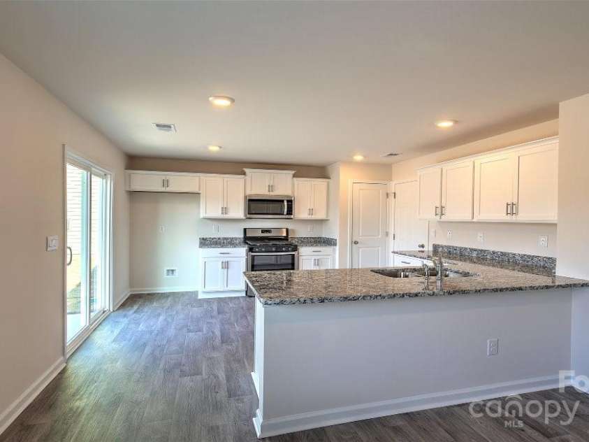 215 Callie River Court, Clyde, NC 28721.  MLS# CAR4255388, YatesRealty ID 29345. Photos are representative
