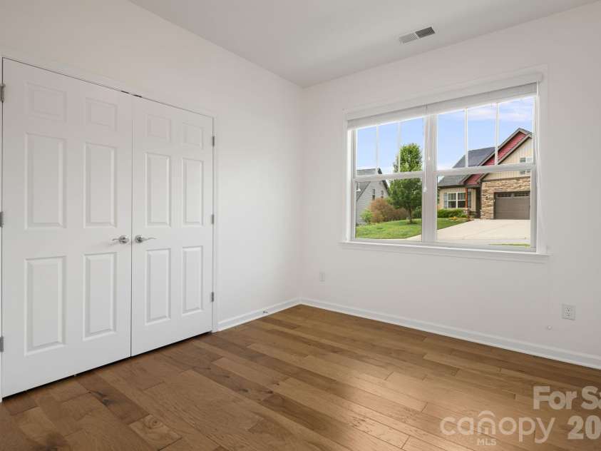 190 Water Leaf Drive, Weaverville, NC 28787.  MLS# CAR4387080, YatesRealty ID 29346. Lower level bedroom with new flooring