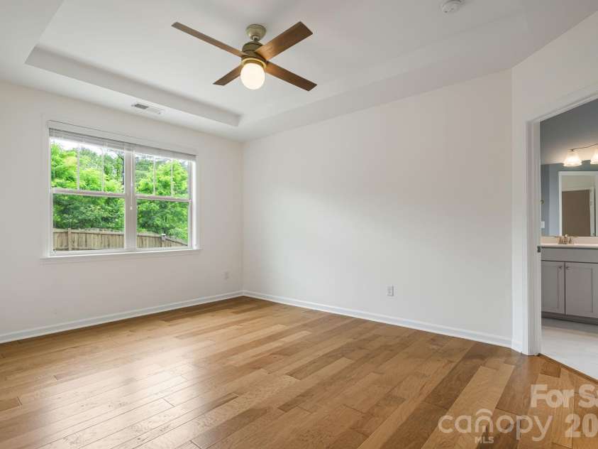 190 Water Leaf Drive, Weaverville, NC 28787.  MLS# CAR4387080, YatesRealty ID 29346. Primary bedroom with a tray ceiling and great light!