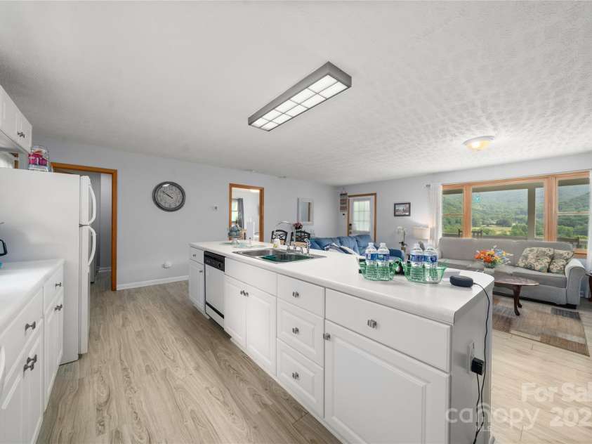262 Lewis Lane, Maggie Valley, NC 28751.  MLS# CAR4265757, YatesRealty ID 29347. Island  is open to the great room