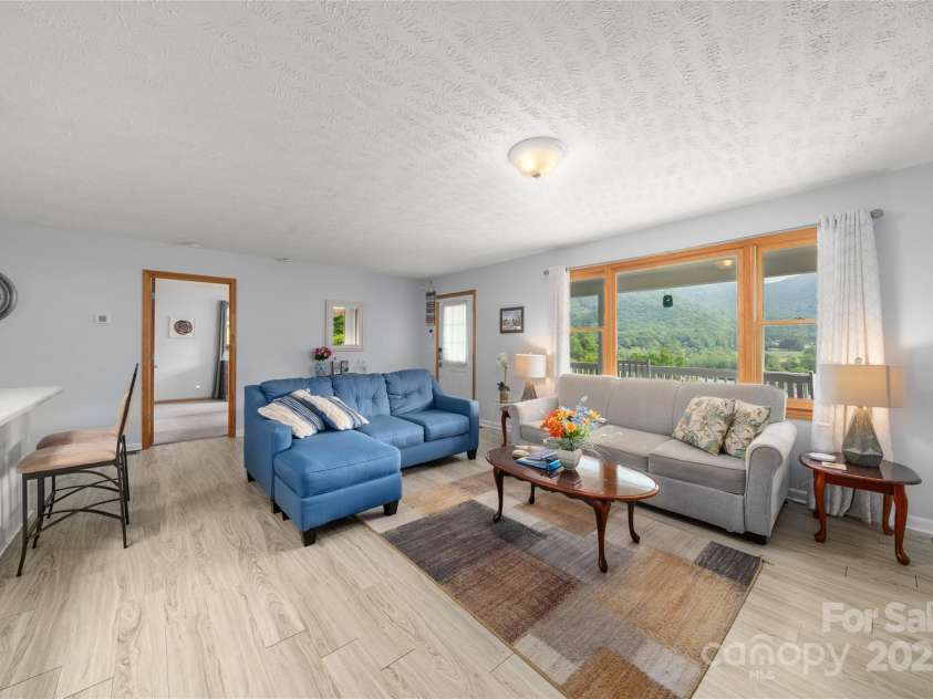 262 Lewis Lane, Maggie Valley, NC 28751.  MLS# CAR4265757, YatesRealty ID 29347. Seating area