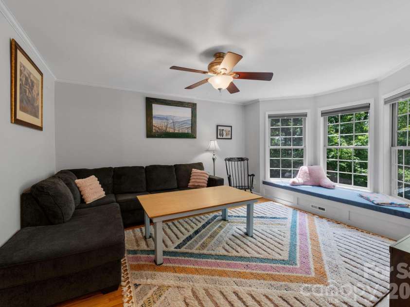 174 deep woods Trail, Canton, NC 28716.  MLS# CAR4378961, YatesRealty ID 29357. Bay window in spacious living room.