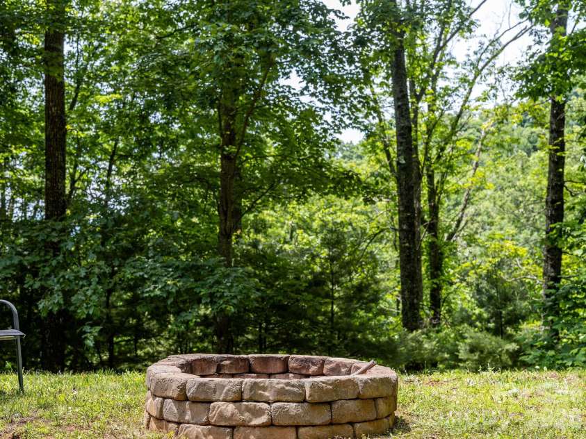 174 deep woods Trail, Canton, NC 28716.  MLS# CAR4378961, YatesRealty ID 29357. Fire Pit 