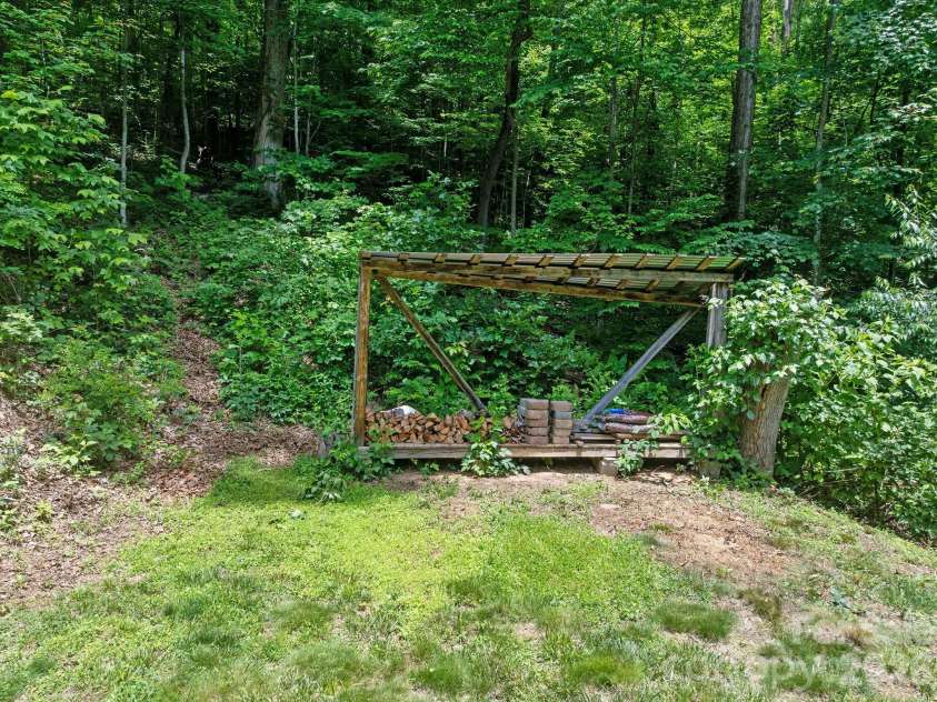 174 deep woods Trail, Canton, NC 28716.  MLS# CAR4378961, YatesRealty ID 29357. Wood storage