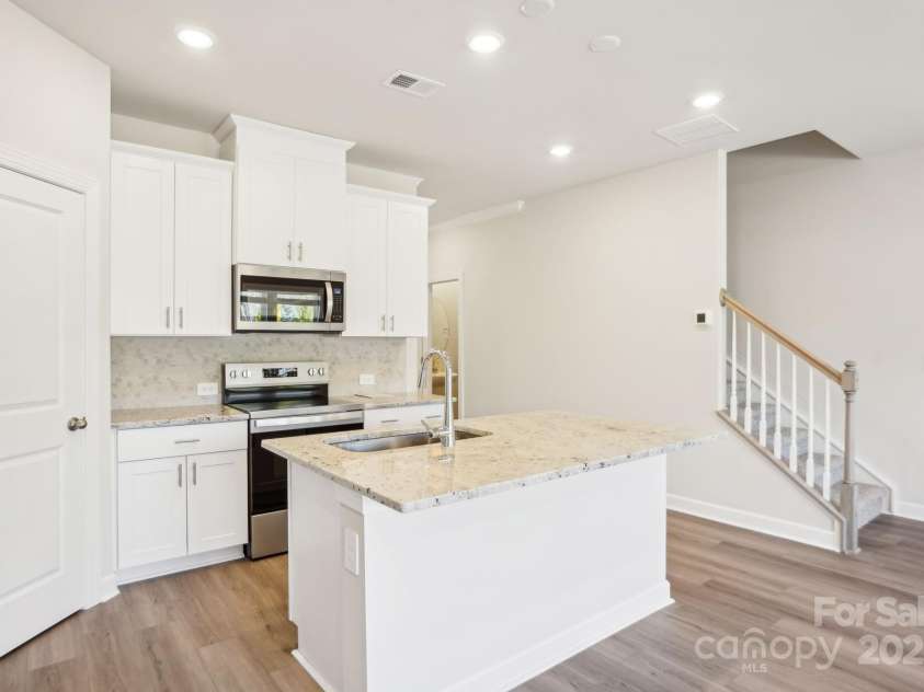 238 Tiger Lily Drive, Fort Mill, SC 29708.  MLS# CAR4277142, YatesRealty ID 29359. Photo is not of the actual home but is an inspirational photo of builder’s model home and may depict options, furnishings, and/or decorator features that are not included.