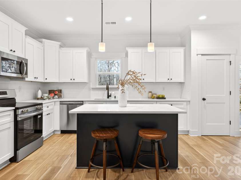 4630 McClure Road, Charlotte, NC 28216.  MLS# CAR4380944, YatesRealty ID 29364. Representation