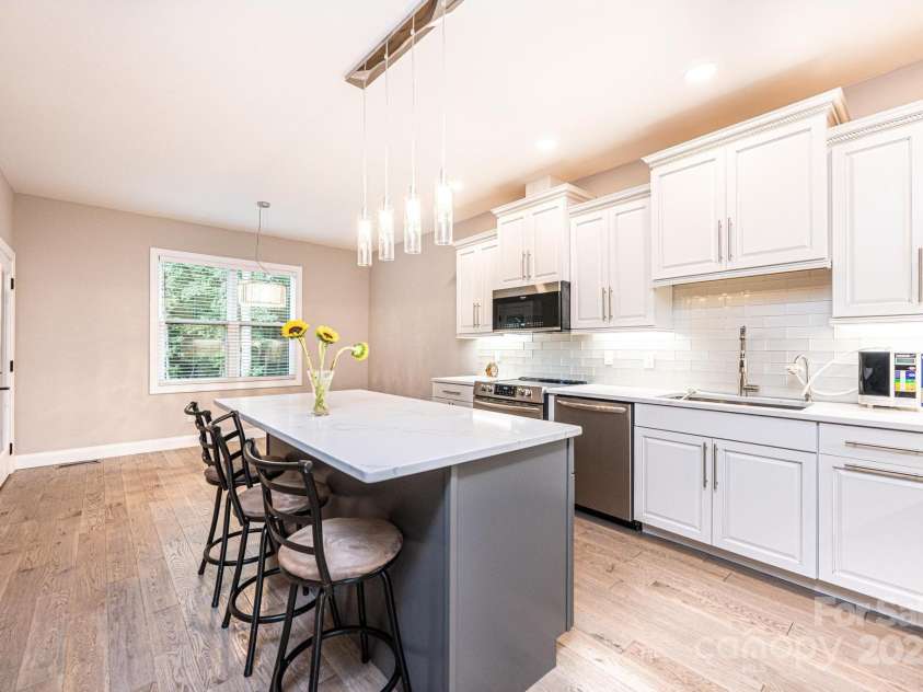 754 River Bend Drive, Granite Falls, NC 28630.  MLS# CAR4304463, YatesRealty ID 29366. Kitchen looking towards Breakfast Area