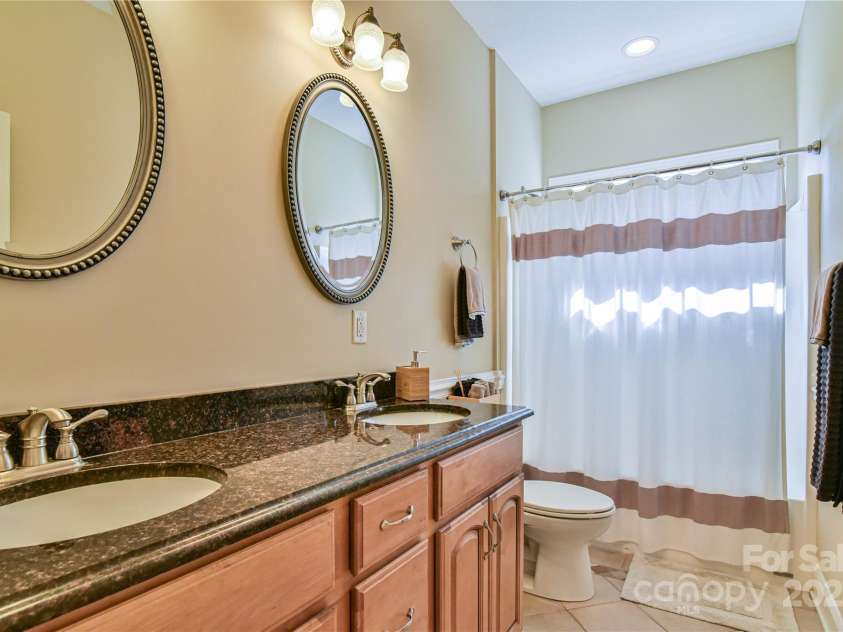 110 Michael Court, Leicester, NC 28748.  MLS# CAR4283846, YatesRealty ID 29373. Full bathroom between bedrooms #2 and #3 located on the main level.