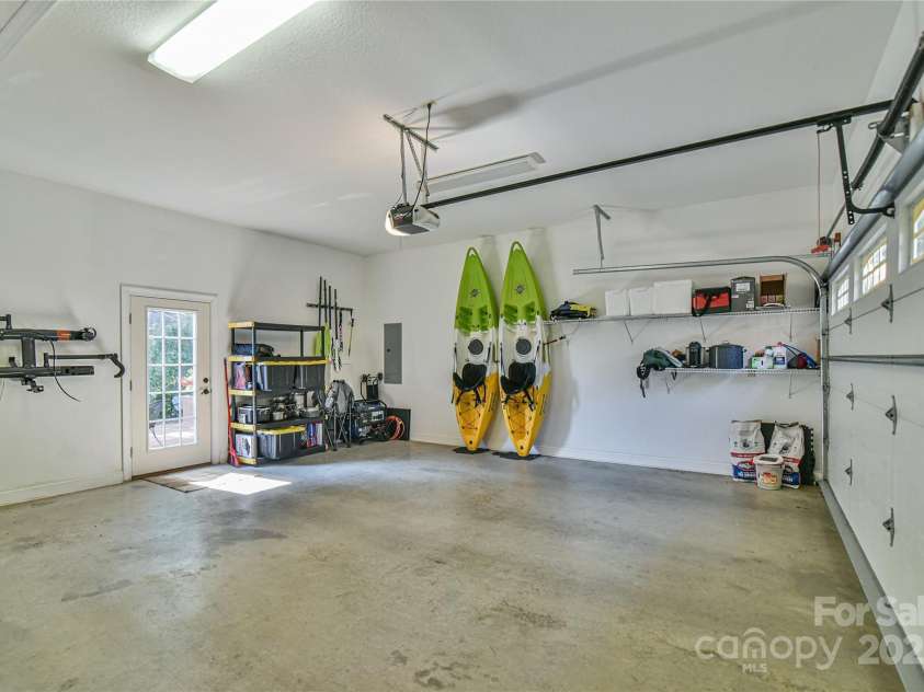 110 Michael Court, Leicester, NC 28748.  MLS# CAR4283846, YatesRealty ID 29373. Upper level 2 car garage with access to the main living area at the living room location.