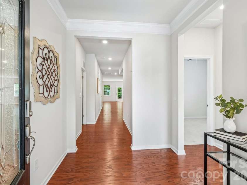 128 Van Gogh Trail, Mount Holly, NC 28120.  MLS# CAR4387655, YatesRealty ID 29376. Elegant front entry hall