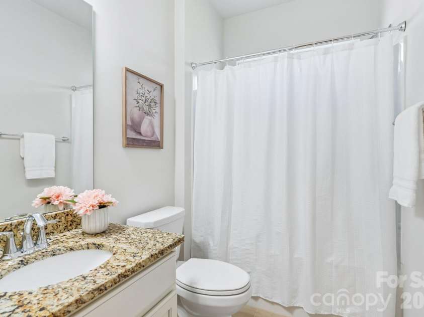 128 Van Gogh Trail, Mount Holly, NC 28120.  MLS# CAR4387655, YatesRealty ID 29376. Guest bath