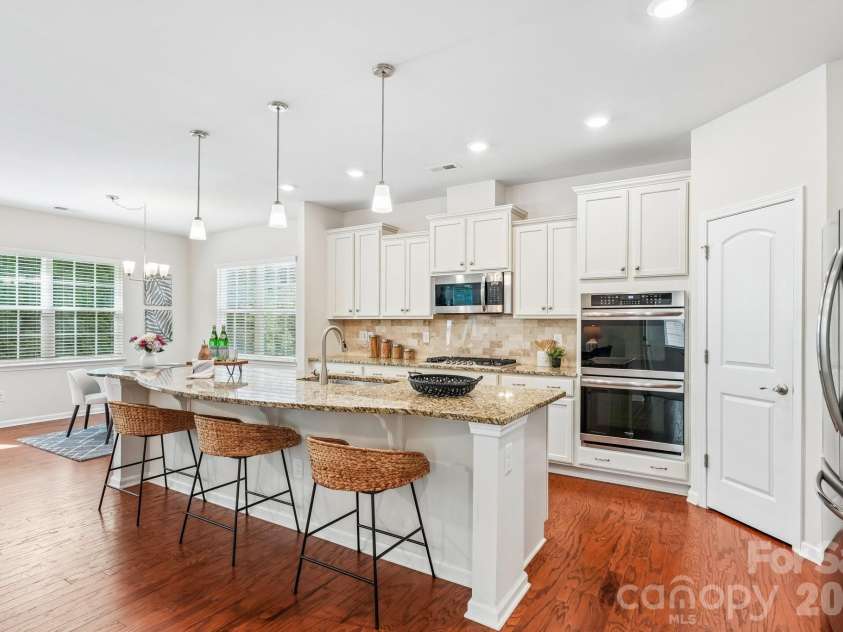 128 Van Gogh Trail, Mount Holly, NC 28120.  MLS# CAR4387655, YatesRealty ID 29376. Kitchen features stainless appliances