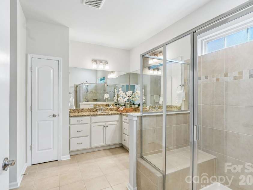 128 Van Gogh Trail, Mount Holly, NC 28120.  MLS# CAR4387655, YatesRealty ID 29376. Spa-like bath