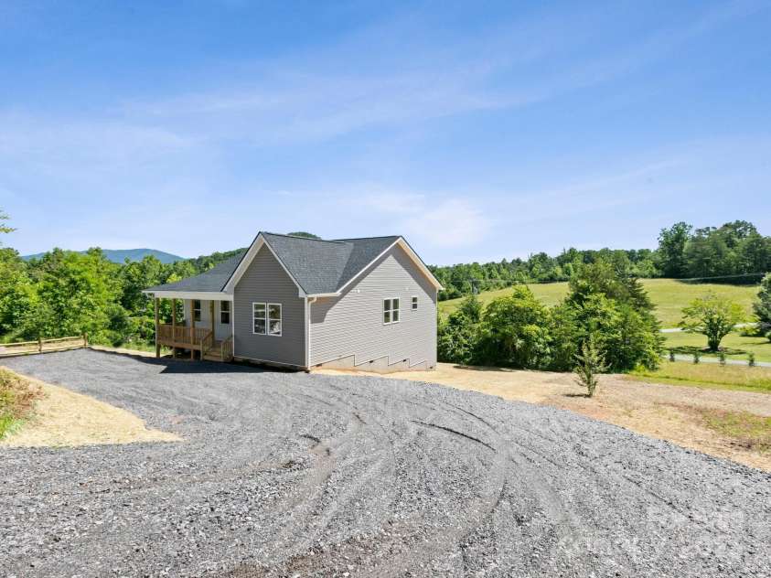 169 Vineyard Village Drive, Old Fort, NC 28762.  MLS# CAR4268925, YatesRealty ID 29376. A country setting with a big useable yard. 