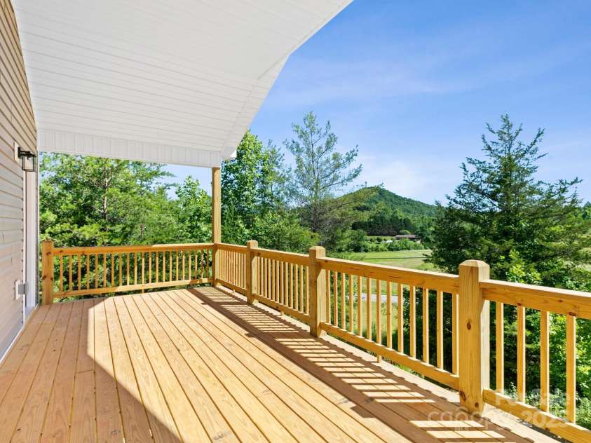 169 Vineyard Village Drive, Old Fort, NC 28762.  MLS# CAR4268925, YatesRealty ID 29376. Imagine having your breakfast here on your backporch.